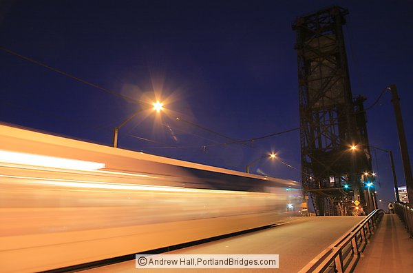 MAX train going over Steel Bridge at Dusk